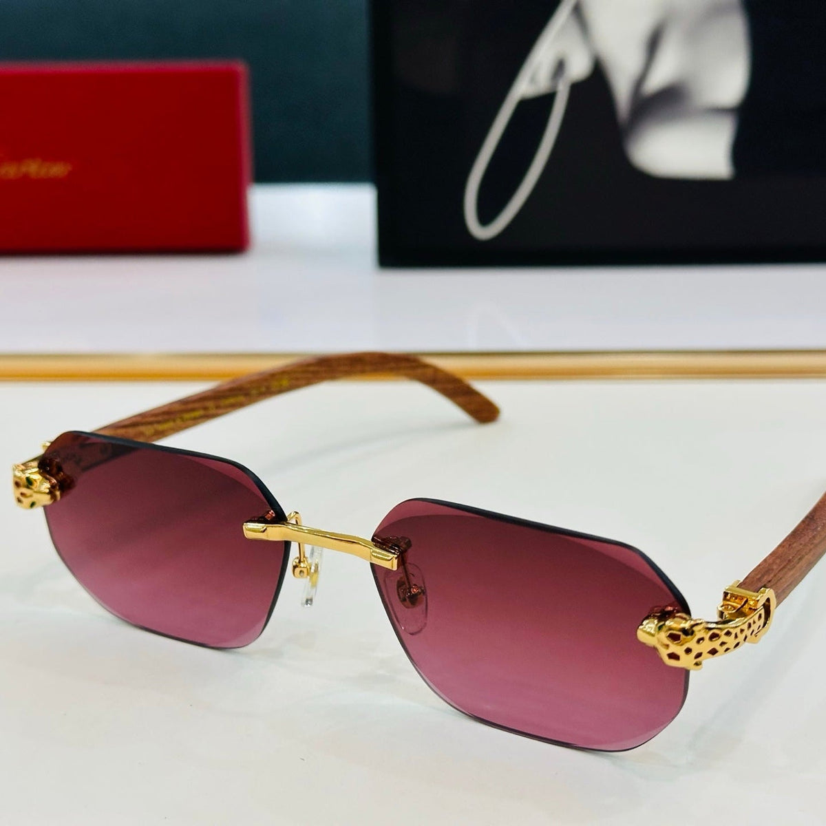 CARTIER PANTHÈRE RIMLESS OVAL FRAME SUNGLASSES  543637 IN METAL