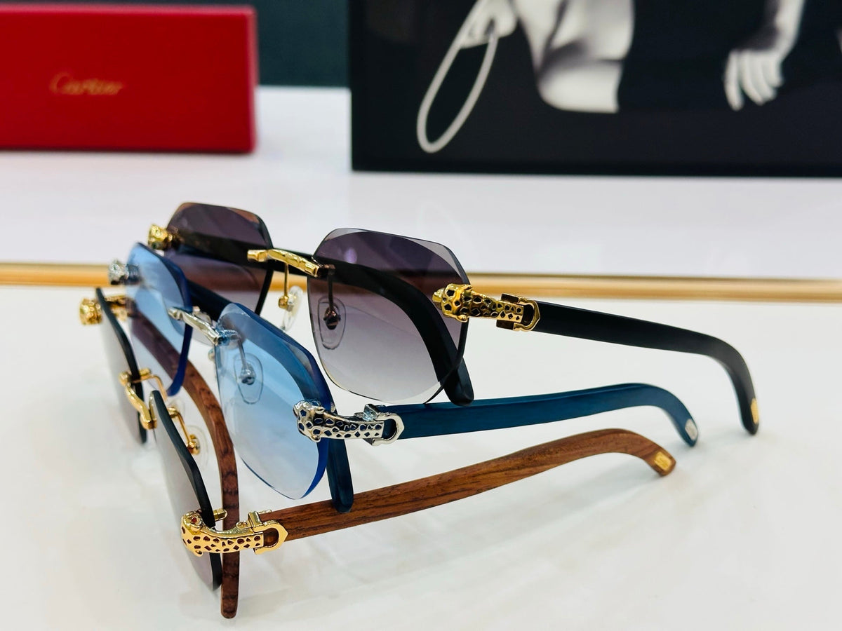 CARTIER PANTHÈRE RIMLESS OVAL FRAME SUNGLASSES  543637 IN METAL